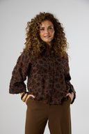 BLOUSE MET RELIËF BLOEMBORDUURSELS